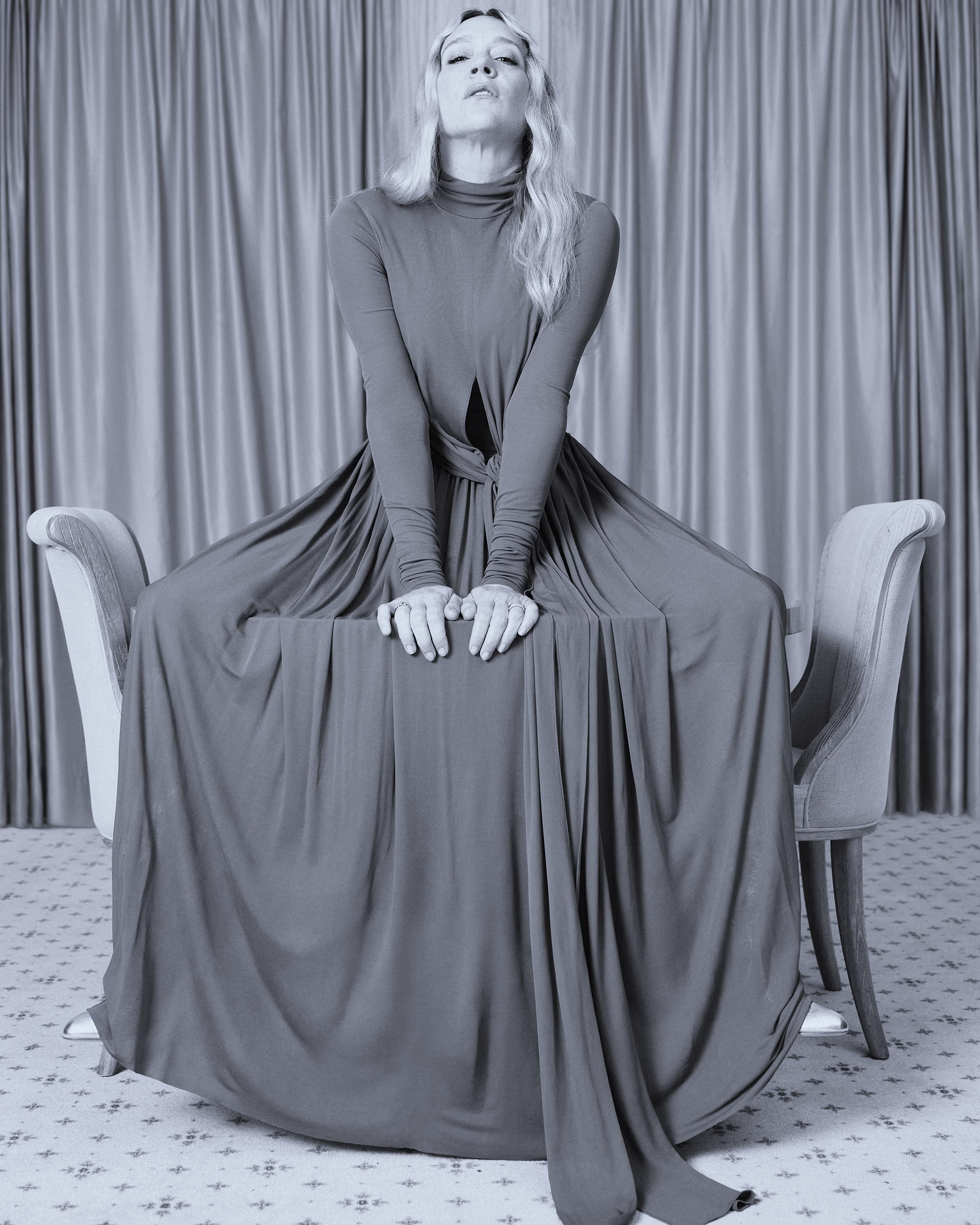 Chloë wears dress by PROENZA SCHOULER and shoes by STUART WEITZMAN.