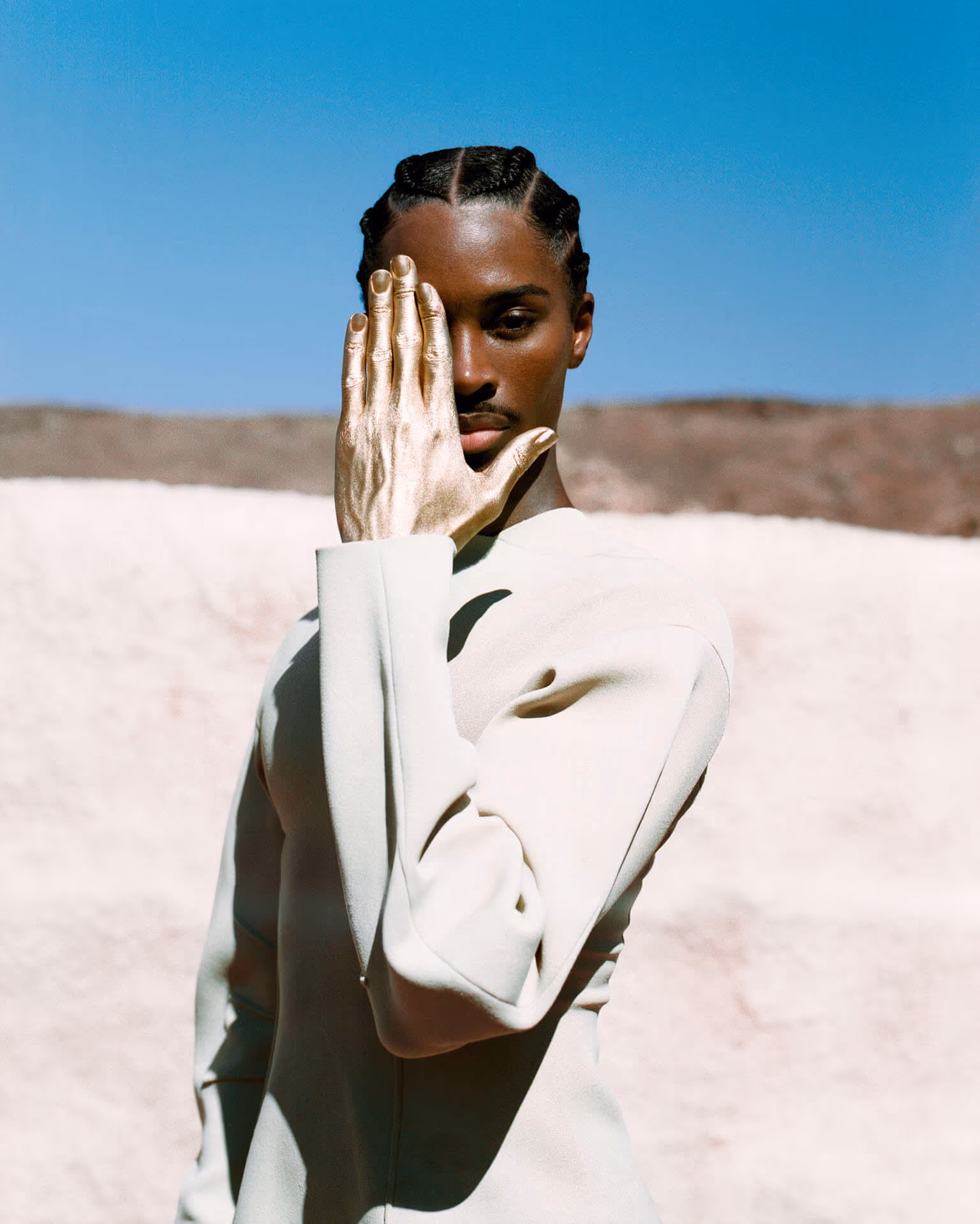 Alton wears full look by JIL SANDER.