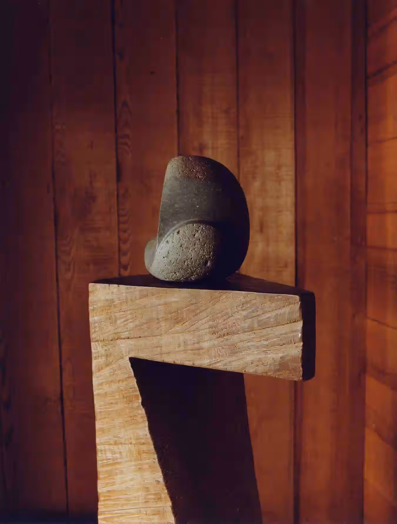Detail of Blunk’s sculpture Head made in 1994 using river stone and salvagedredwood.