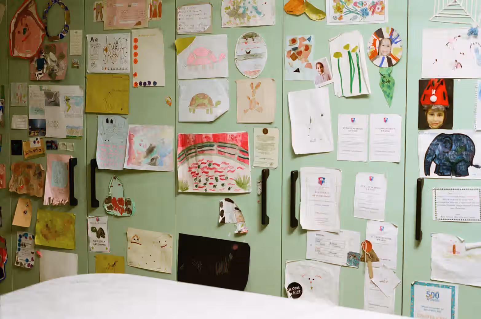 Kitchen wall with artwork by Newson’s two daughters.