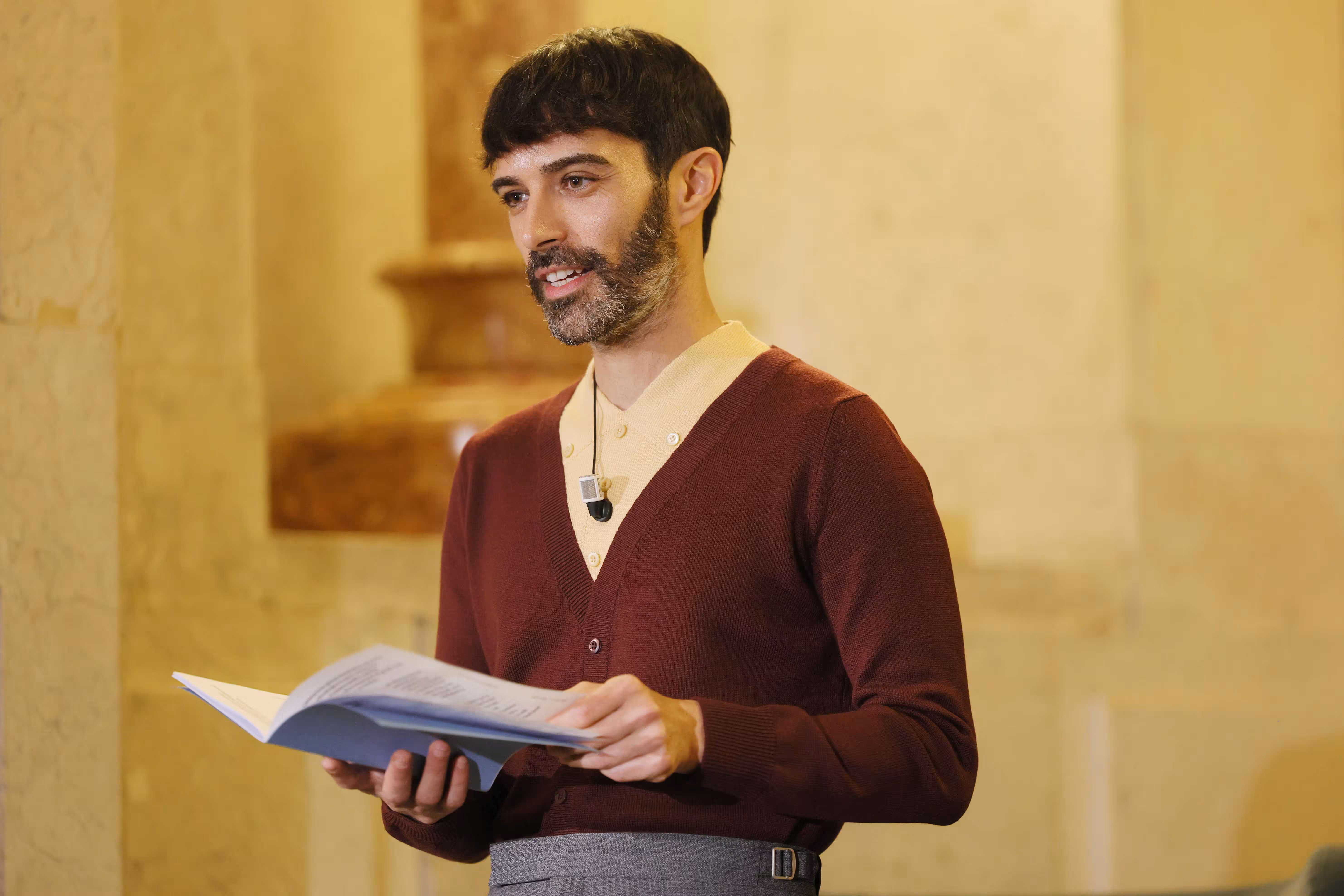 Andrea Trimarchi of Formafantasma reading at Prada Frames. Image courtesy of Prada.
