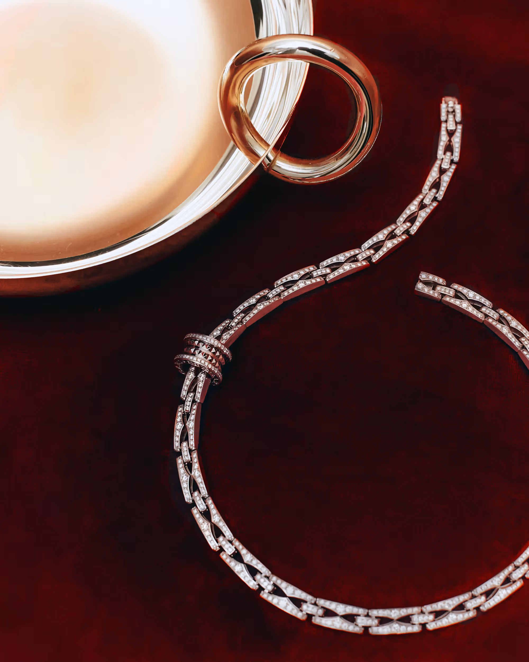 Necklace by BULGARI and bowl by CHRISTOFLE.