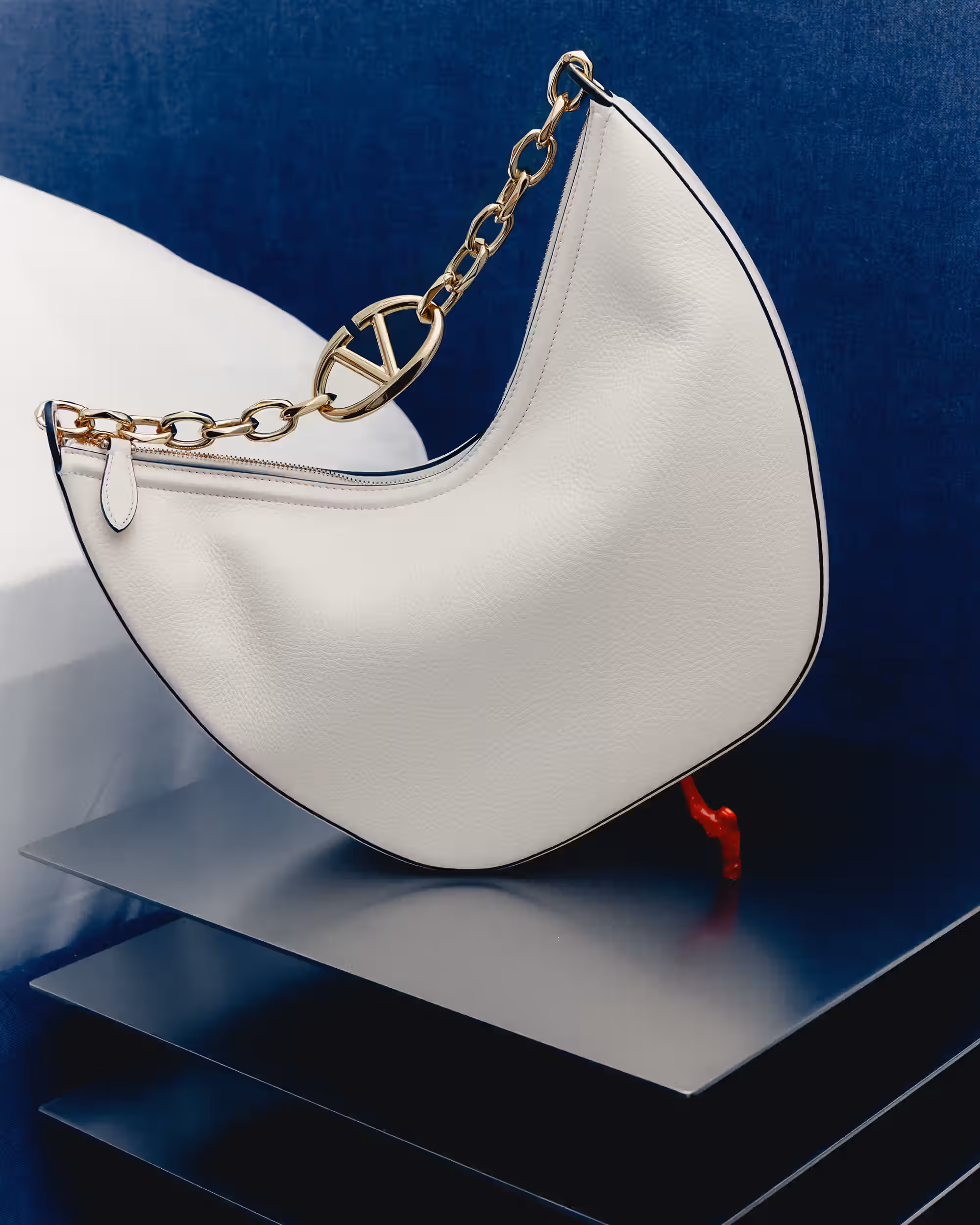 Bag by VALENTINO and table by FORD BOSTWICK.