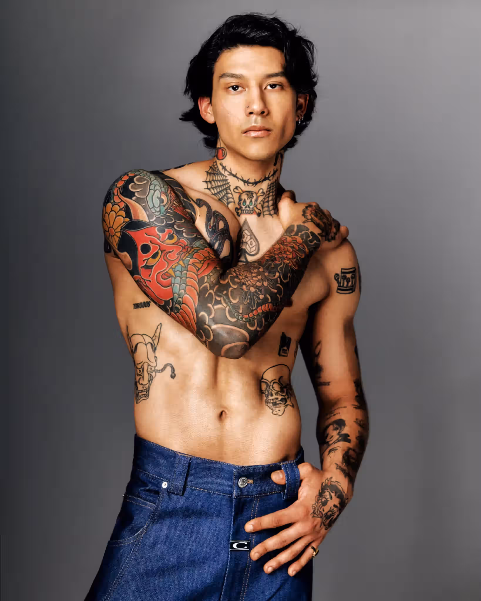 Christiano Wennmann wears ring by TIFFANY & CO. and pants by COMMISSION.