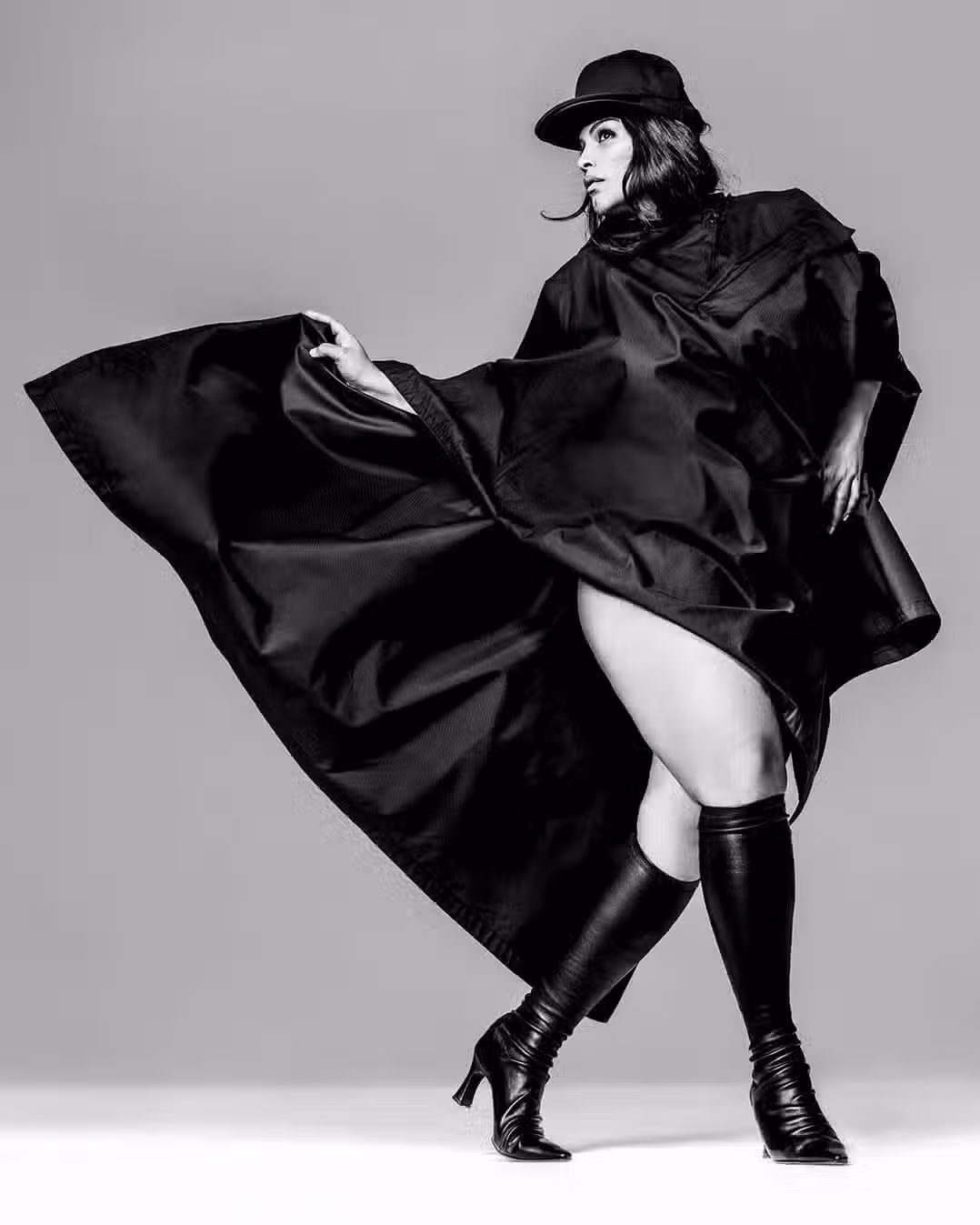 Paloma wears poncho by THE ROW