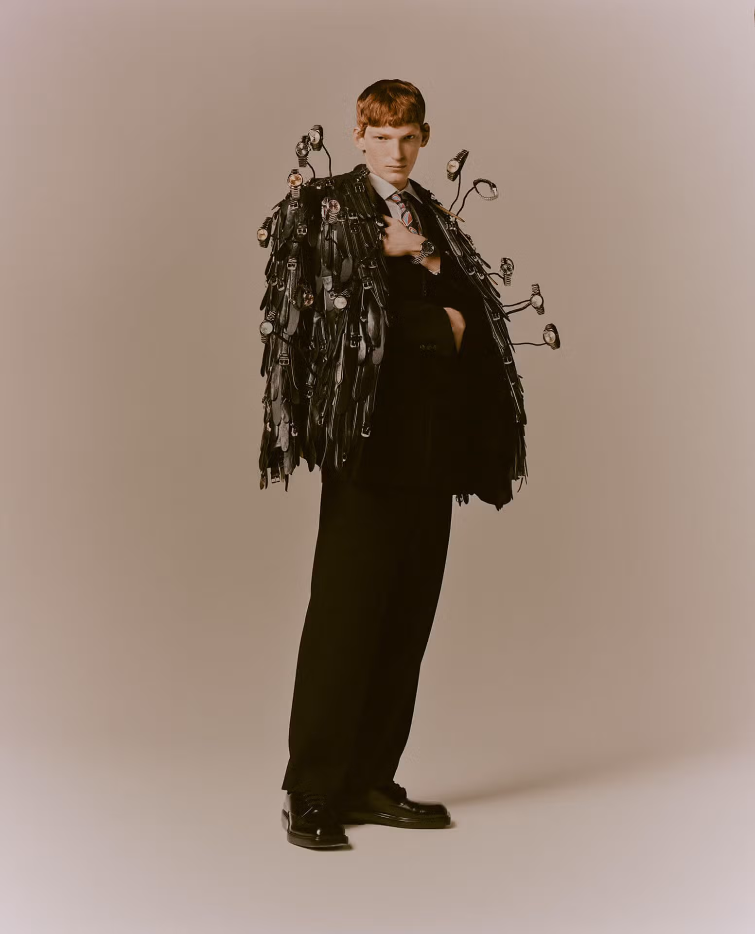 Arthur wears full look by GIORGIO ARMANI