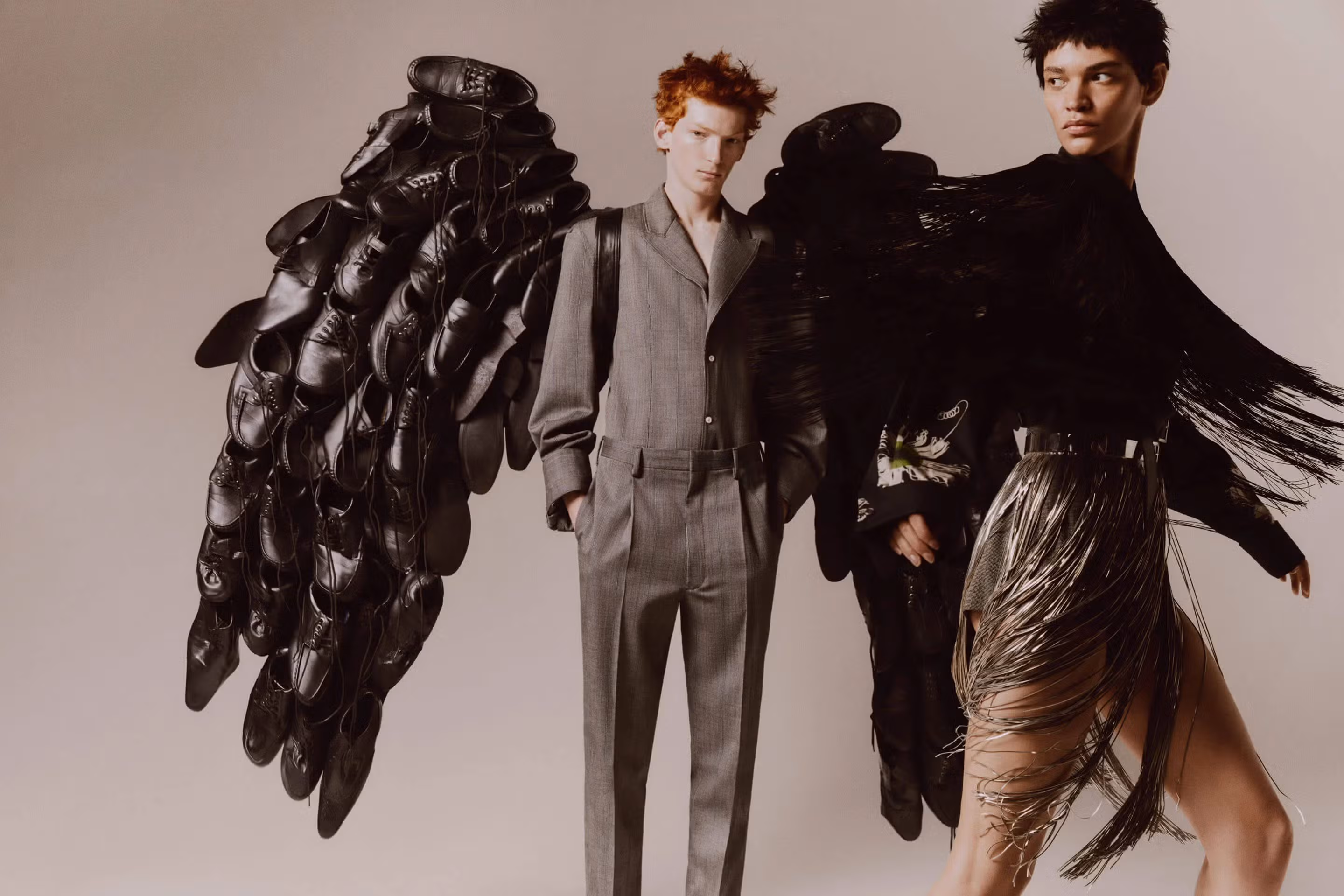 Arthur Del Beato and Kerolyn Soares wear full looks by PRADA.