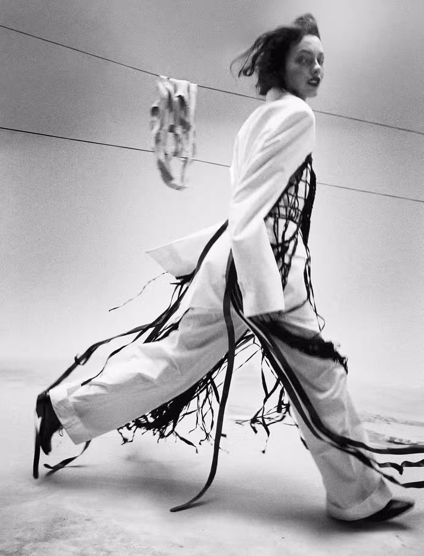 Clara wears full look by ANN DEMEULEMEESTER.