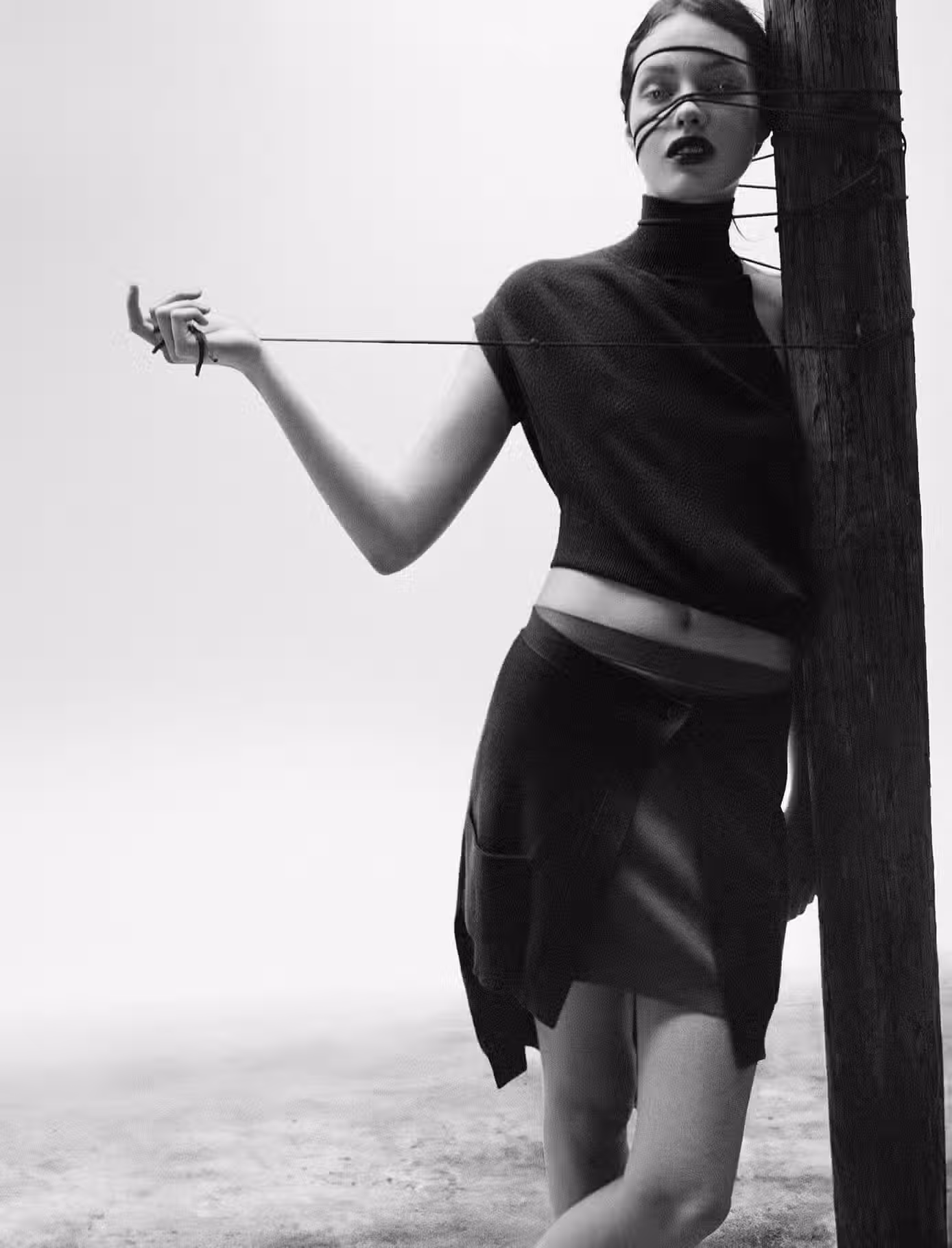 Clara wears full look by FENDI.
