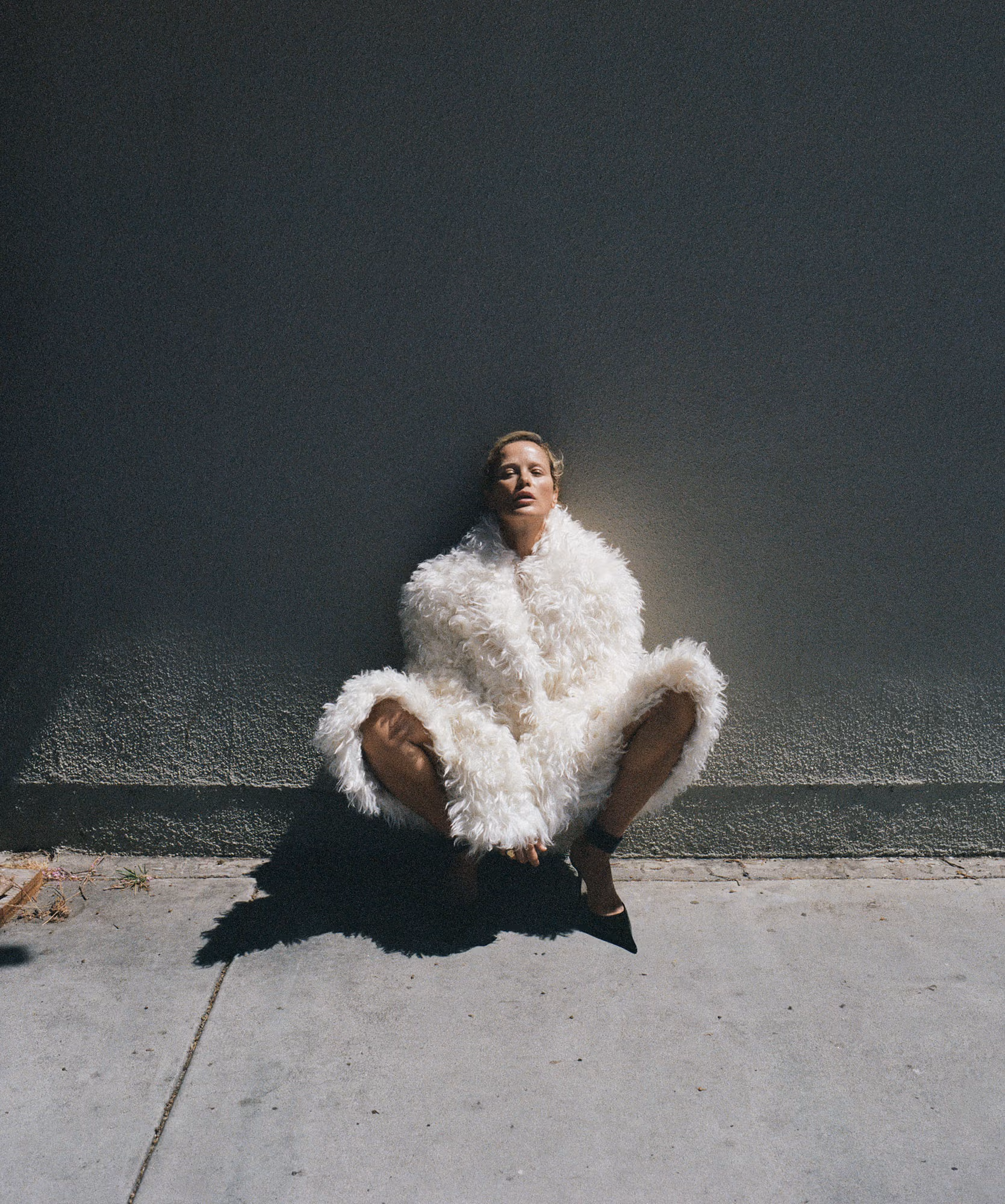 Carolyn Murphy wears coat by MICHAEL KORS COLLECTION