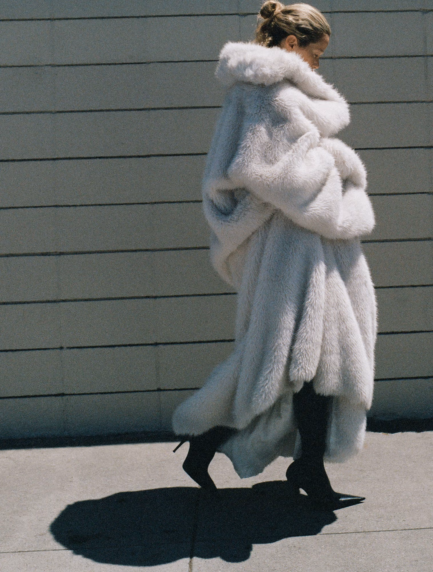 Carolyn wears full look by BALENCIAGA.