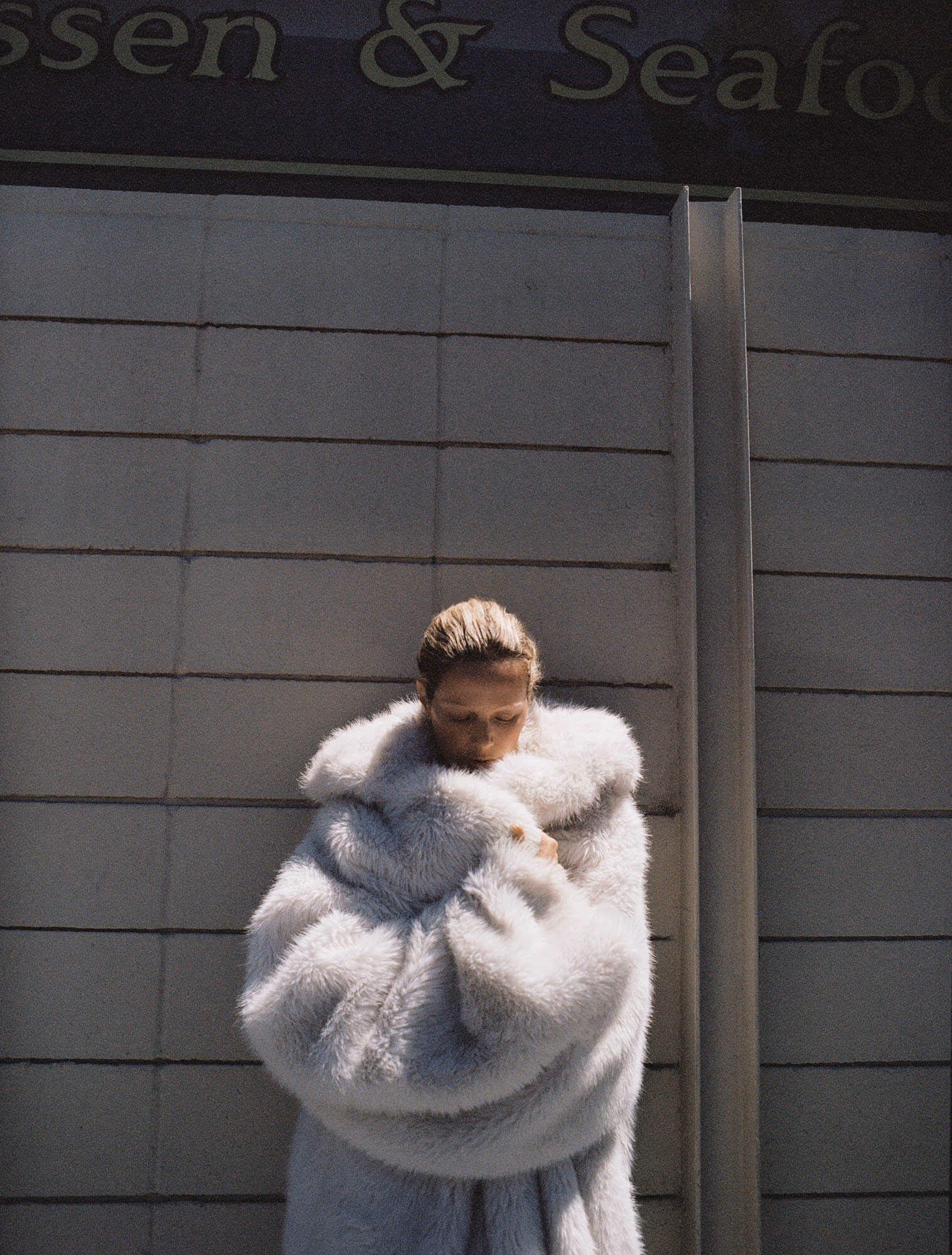 Carolyn wears full look by BALENCIAGA.