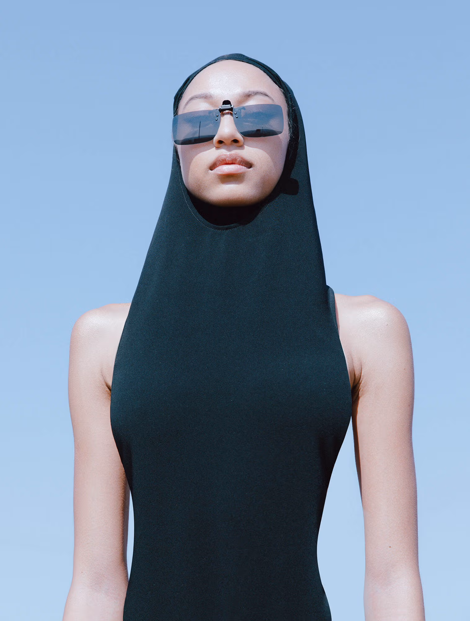 Domonique wears full look by COURRÈGES.Domonique wears full look by COURRÈGES.