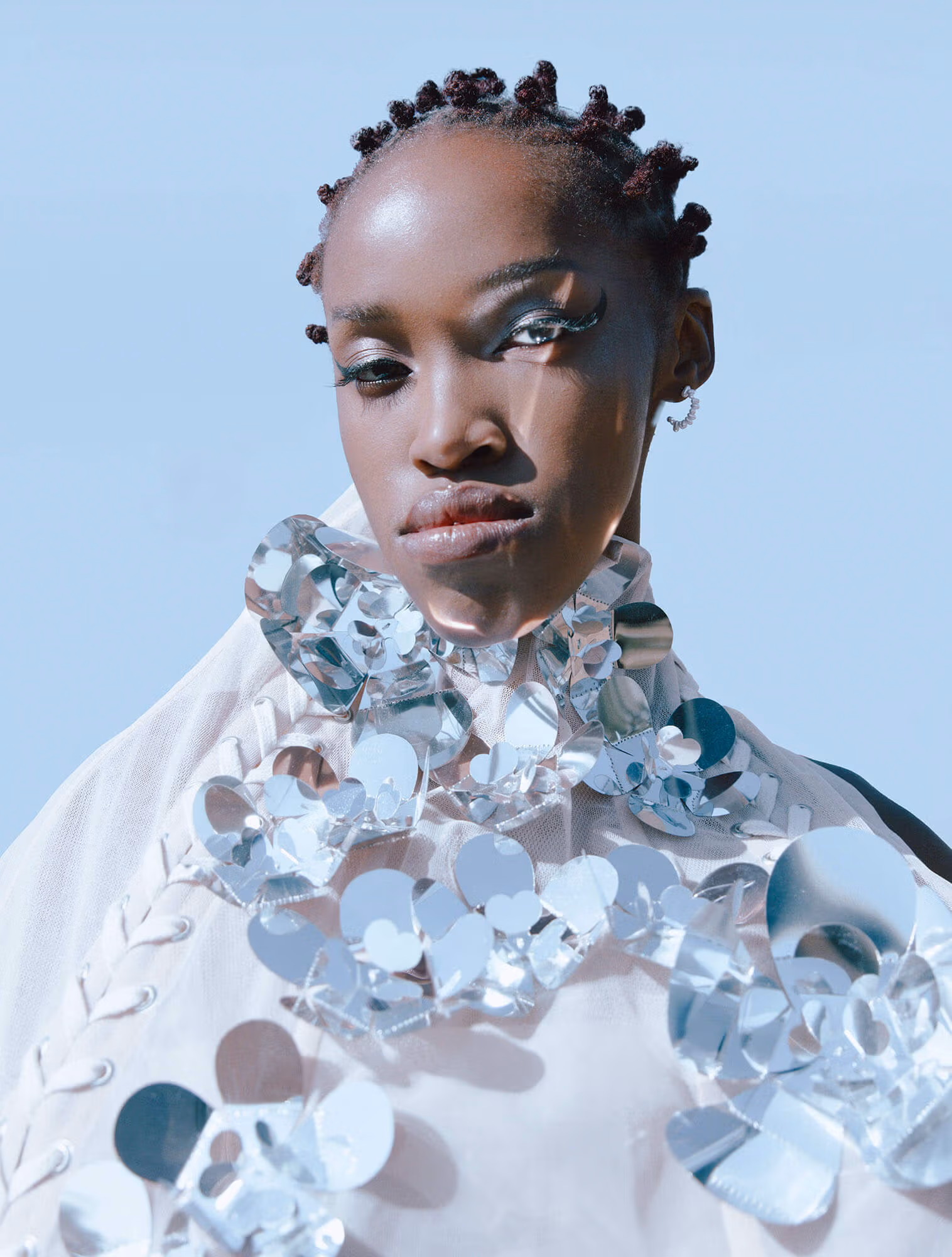 Ponahalo Mojapelo wears corsets by SIMONE ROCHA.