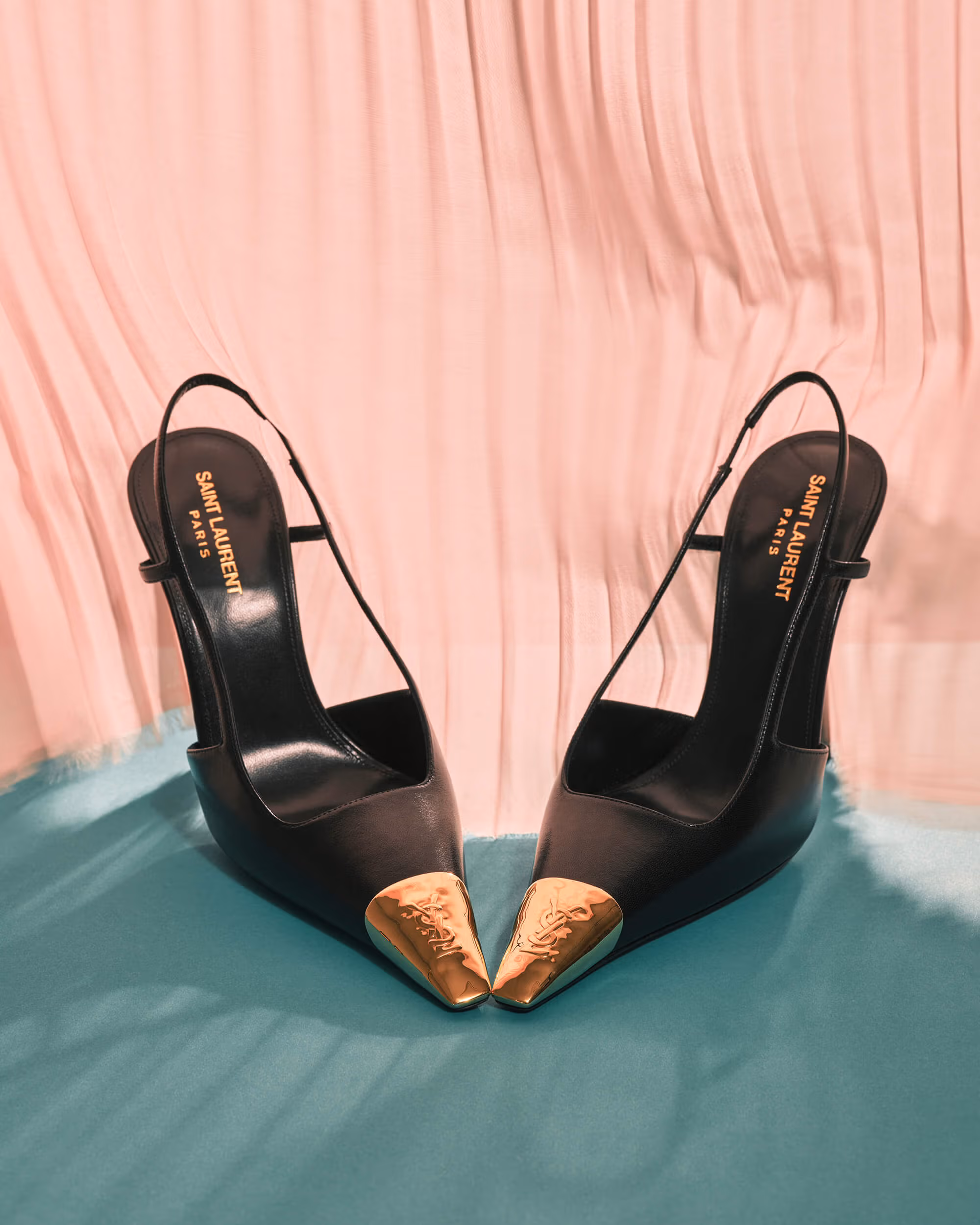 Shoes by SAINT LAURENT.