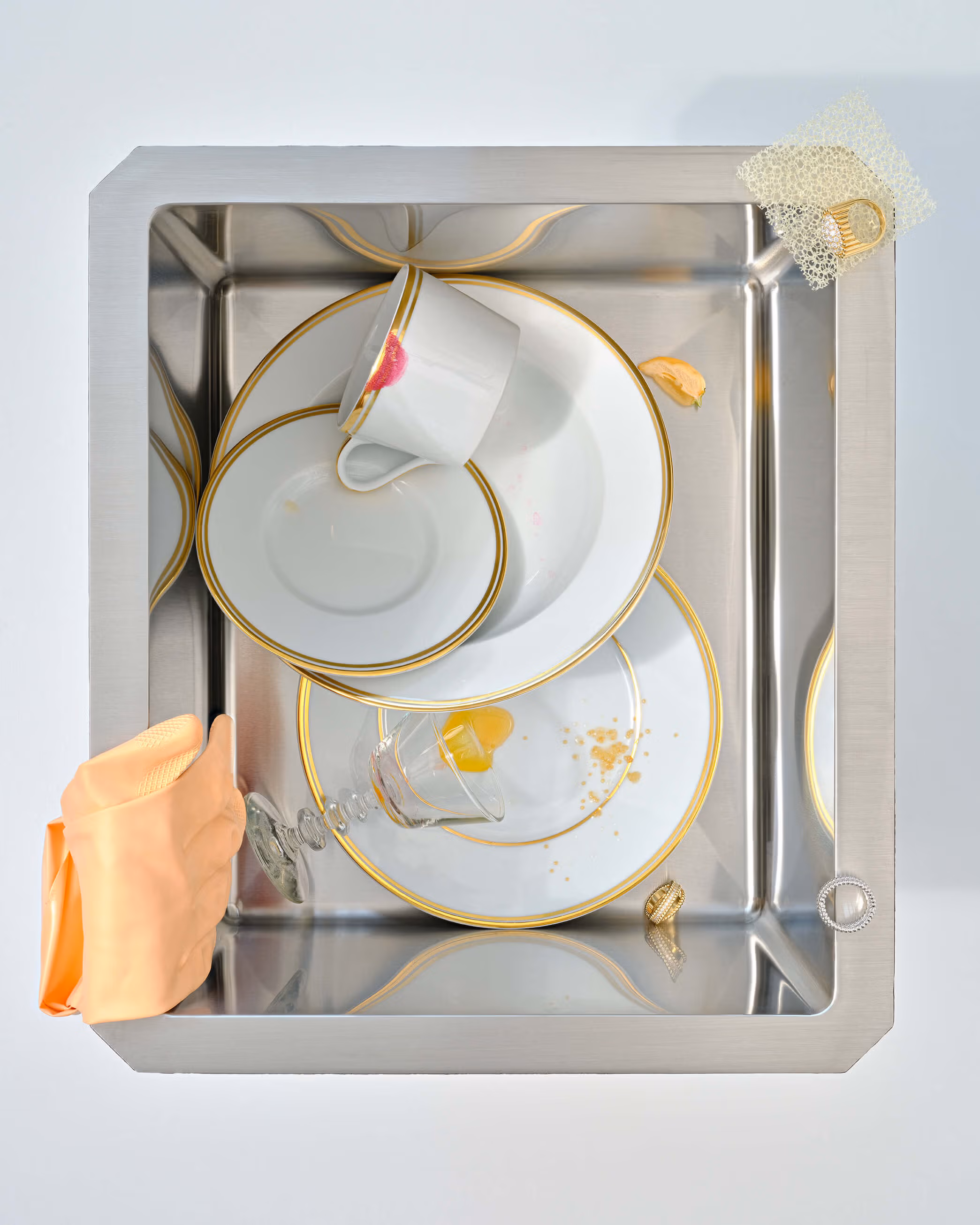 Plates and cup by RALPH LAUREN HOME and rings by VAN CLEEF & ARPELS.