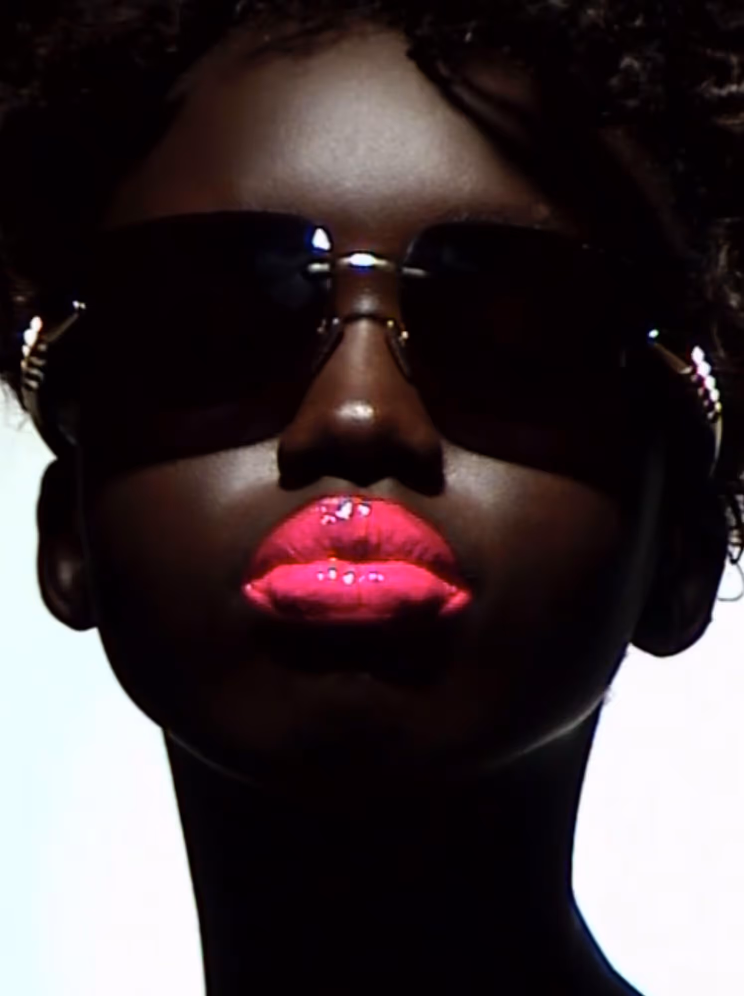 Anyier Anei wears glasses by BULGARI.