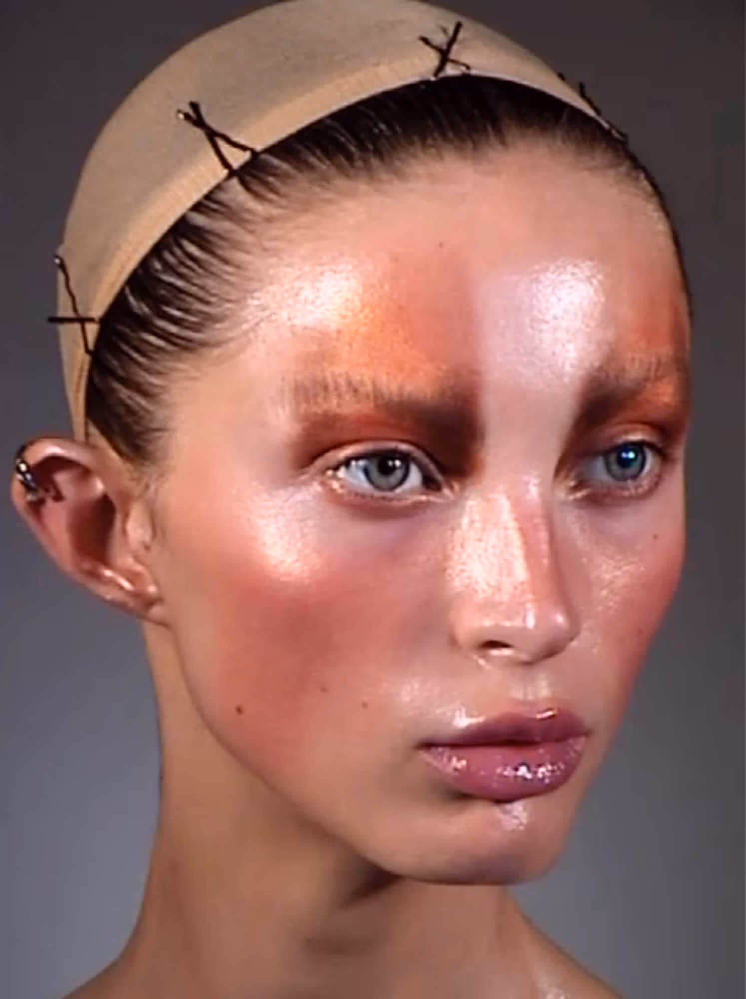 Lulu Wood wears ear cuff by CHANEL.
