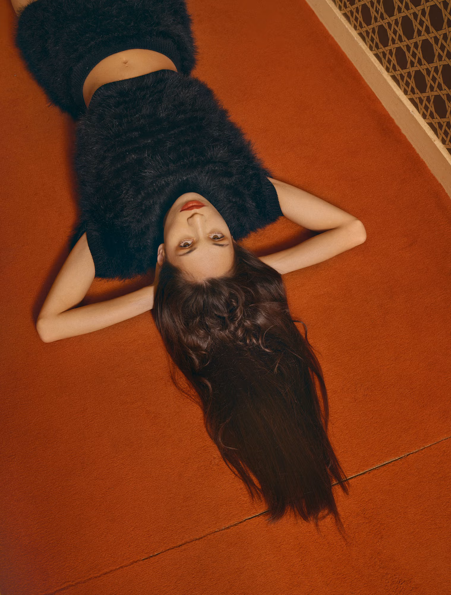 Kiko wears full look by PRADA.