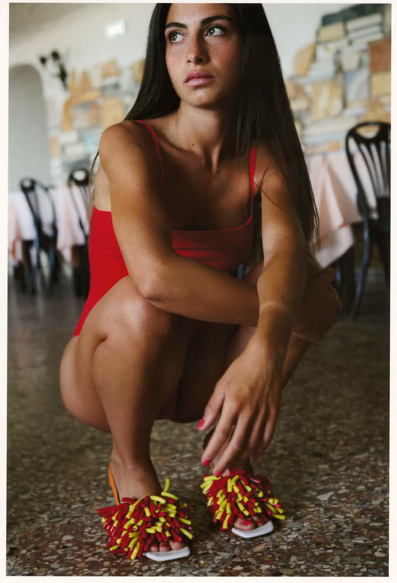 Asia wears swimsuit by ERES and shoes by ZOMER.