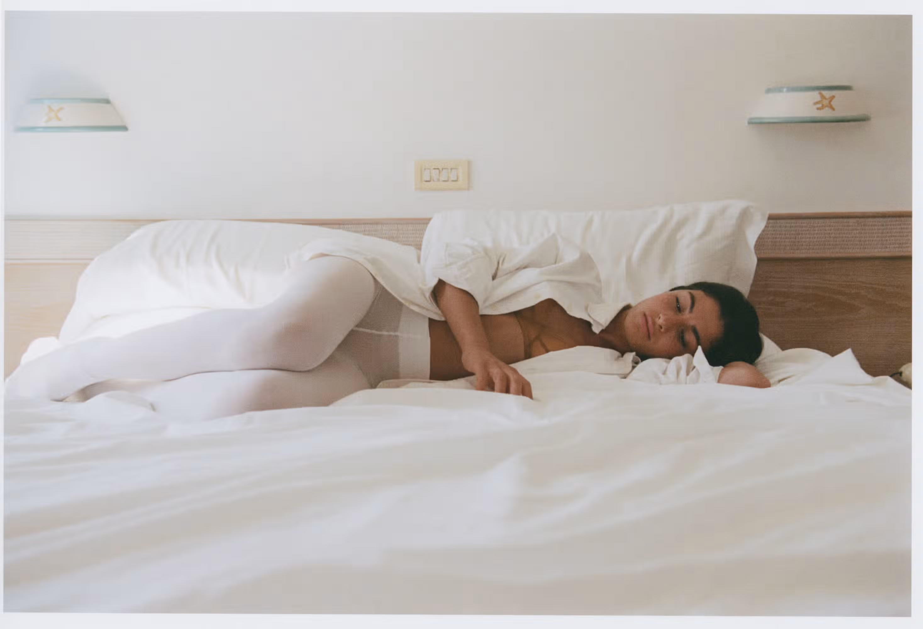 Asia wears underpinnings by ERES and tights by FALKE.