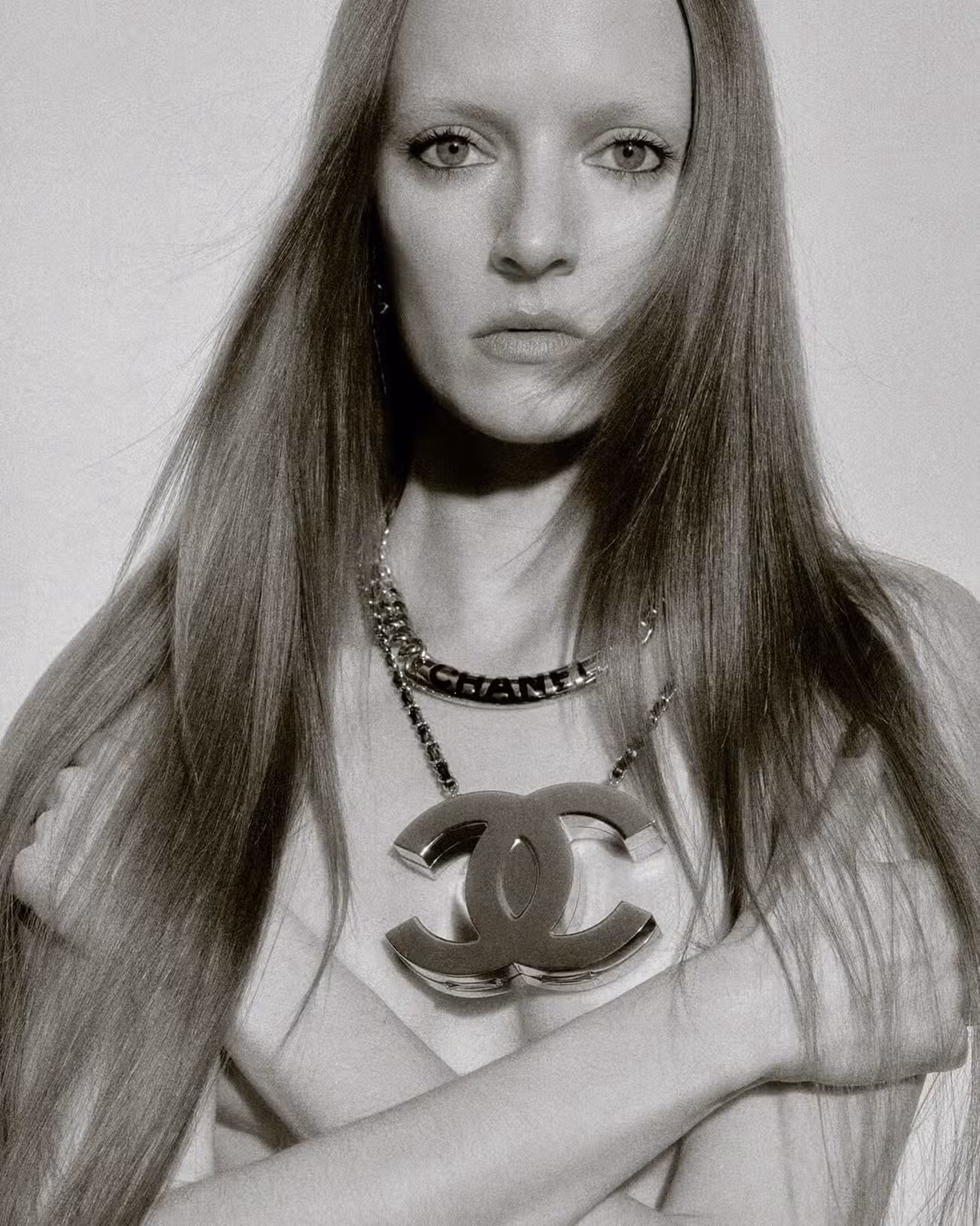 Daria wears necklaces by CHANEL.