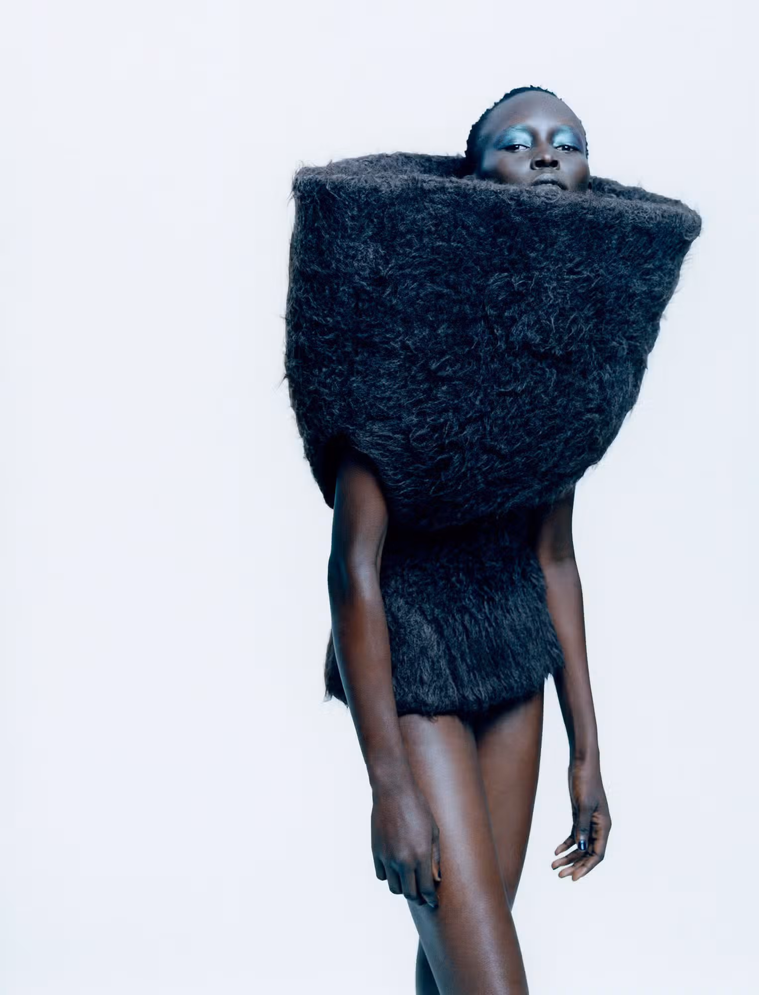 Atem wears top ALEXANDER MCQUEEN.