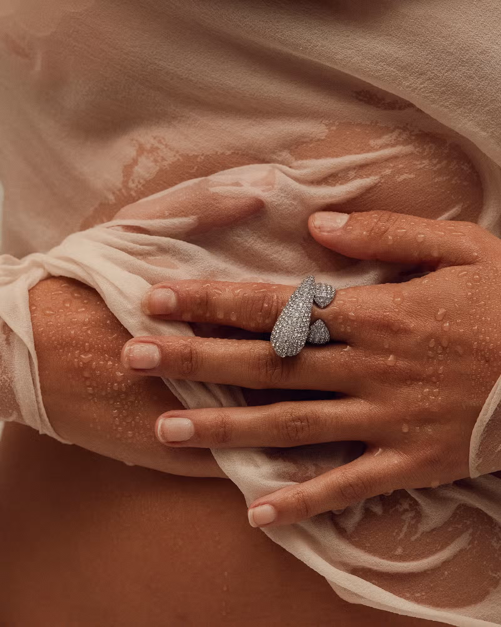 Alici wears top and ring by GIVENCHY.