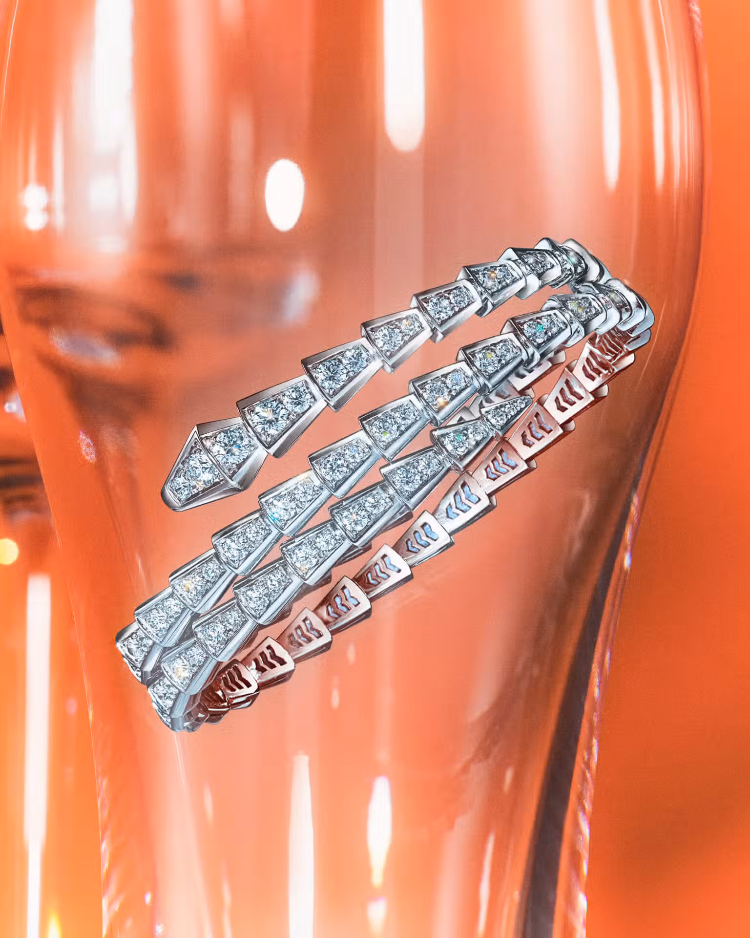 Bracelet by BVLGARI and glasses by BACCARAT.