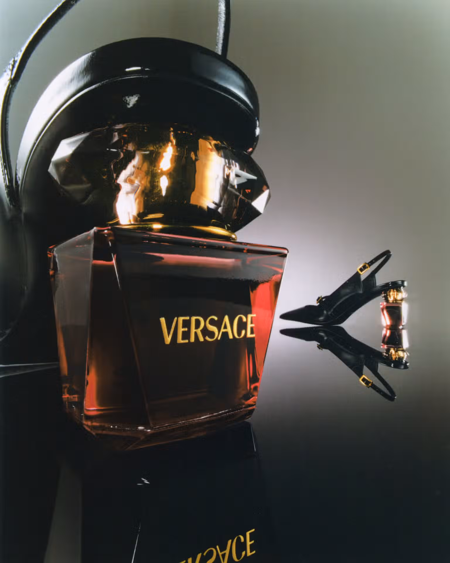 Shoes by VERSACE.