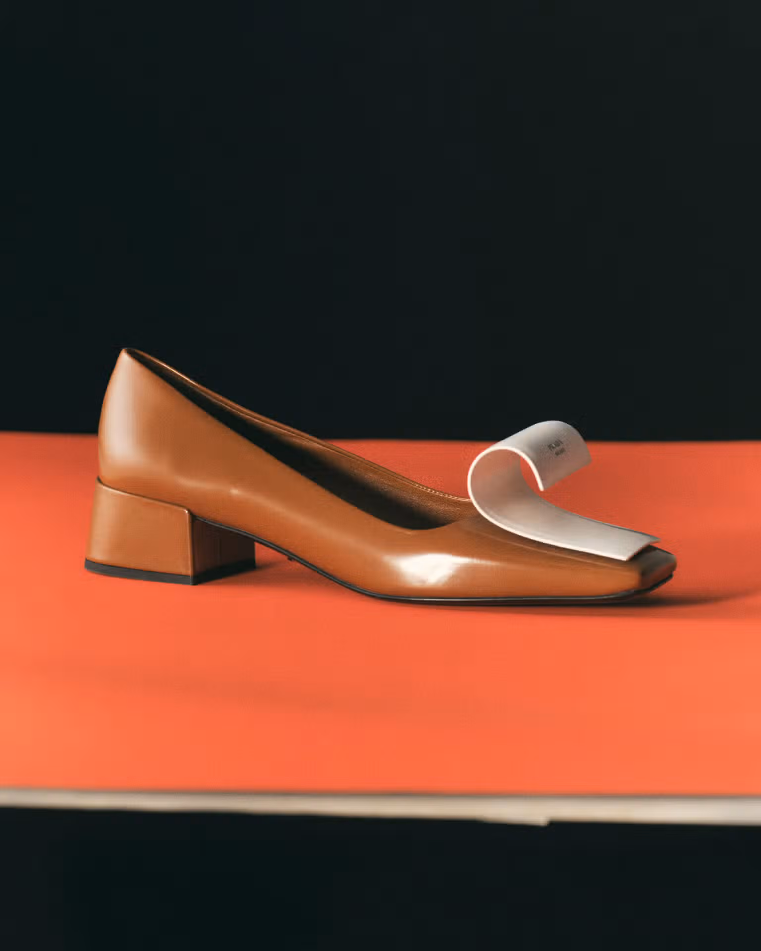 Shoe by PRADA.