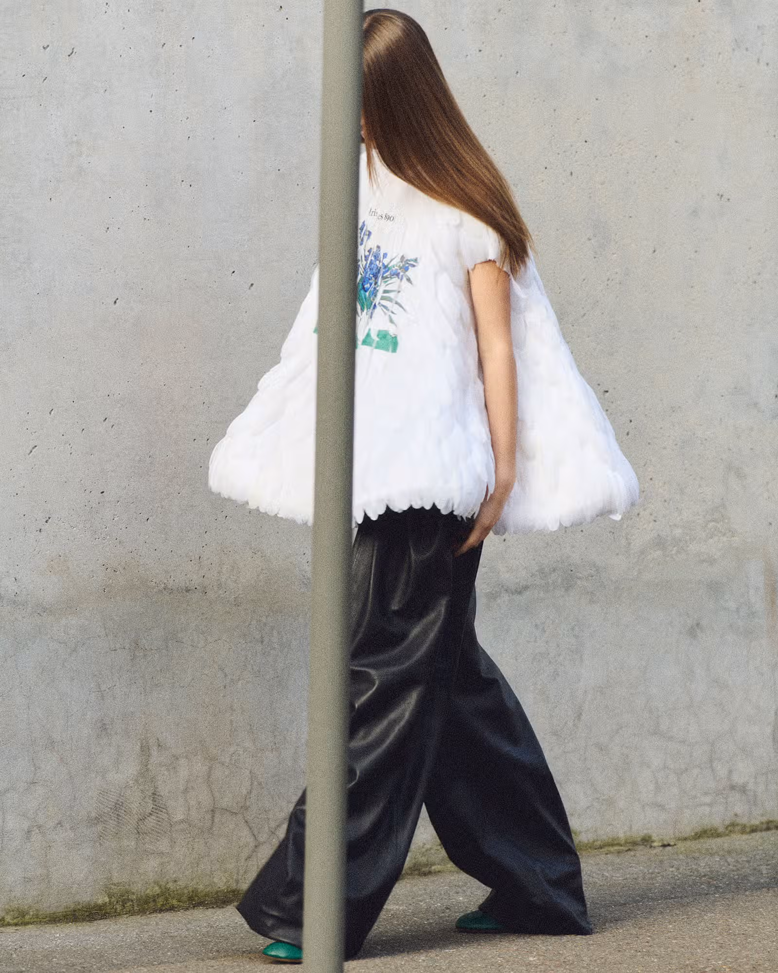 Sahteene wears full look by LOEWE.