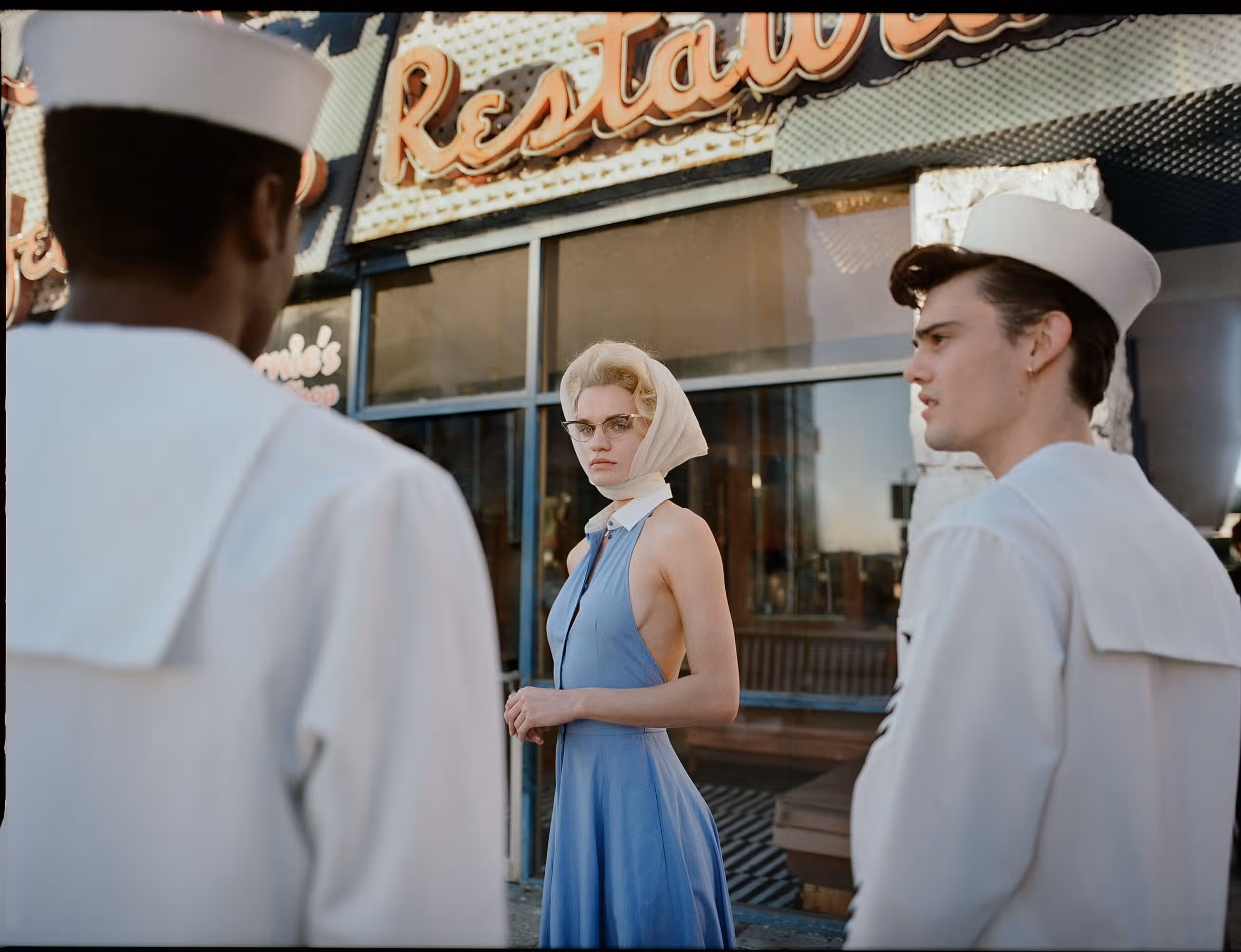 Ksenia Melvil wears dress by RALPH LAUREN.