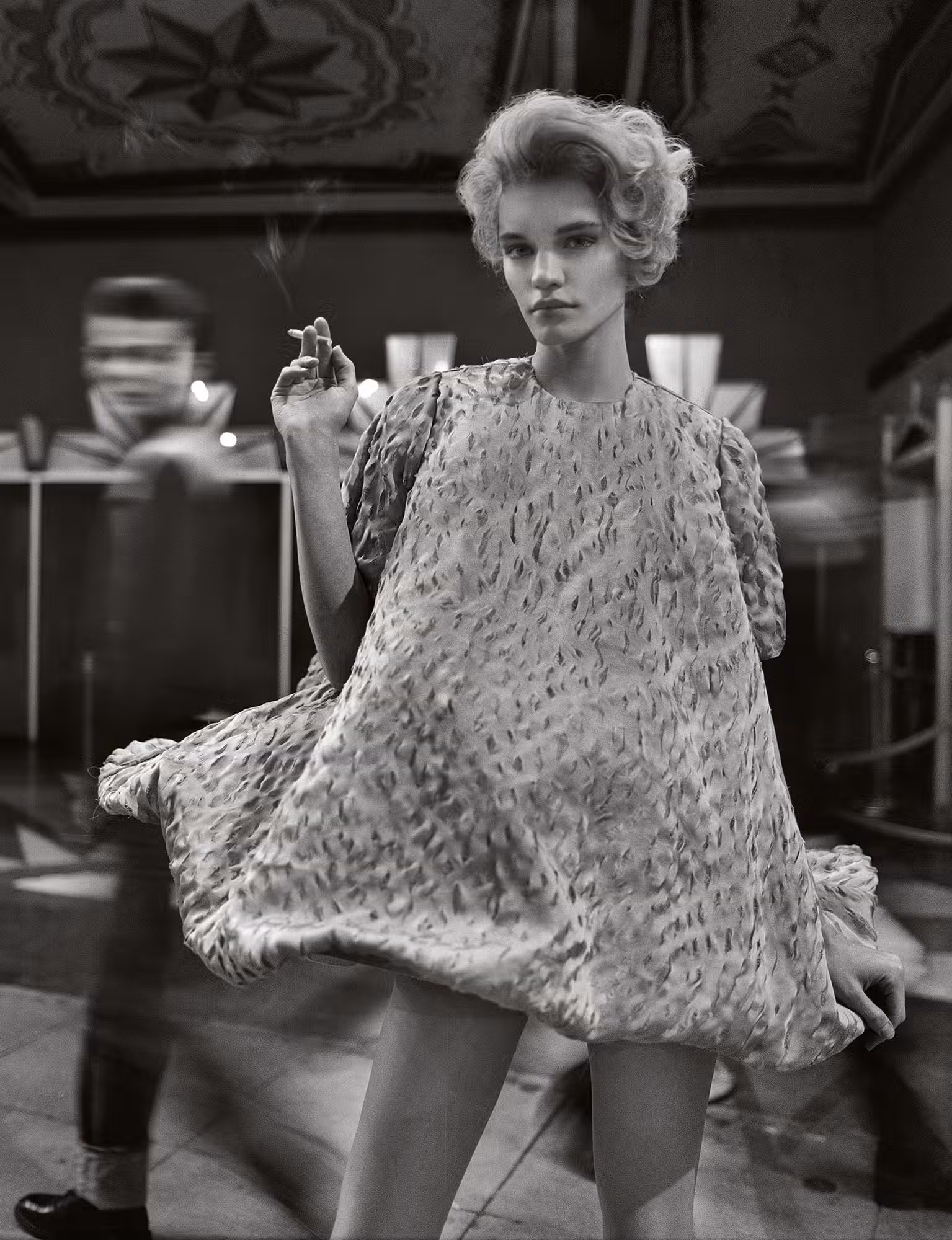 Ksenia wears dress by LOEWE.