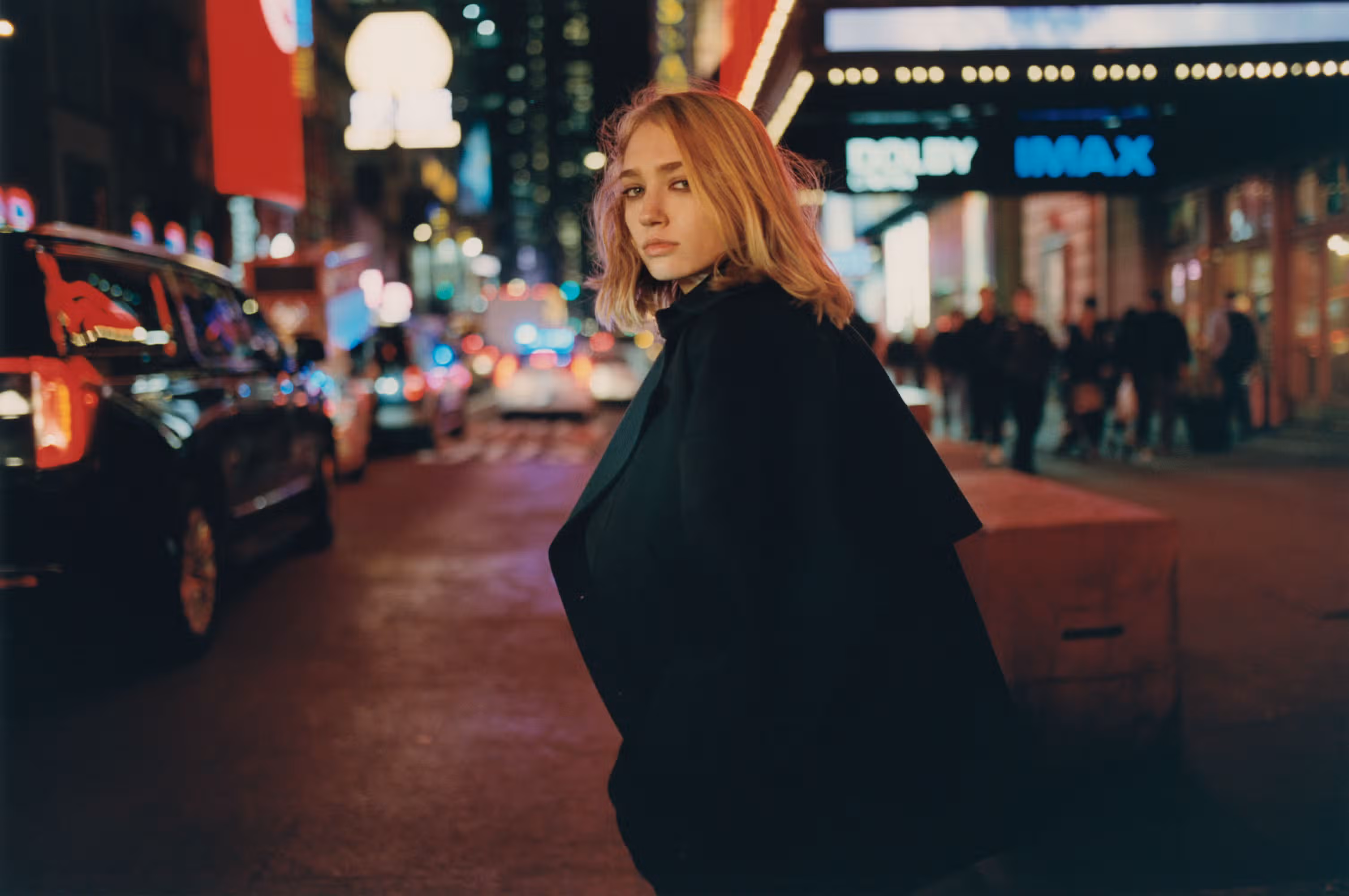 Tess wears coat by MICHAEL KORS COLLECTION.