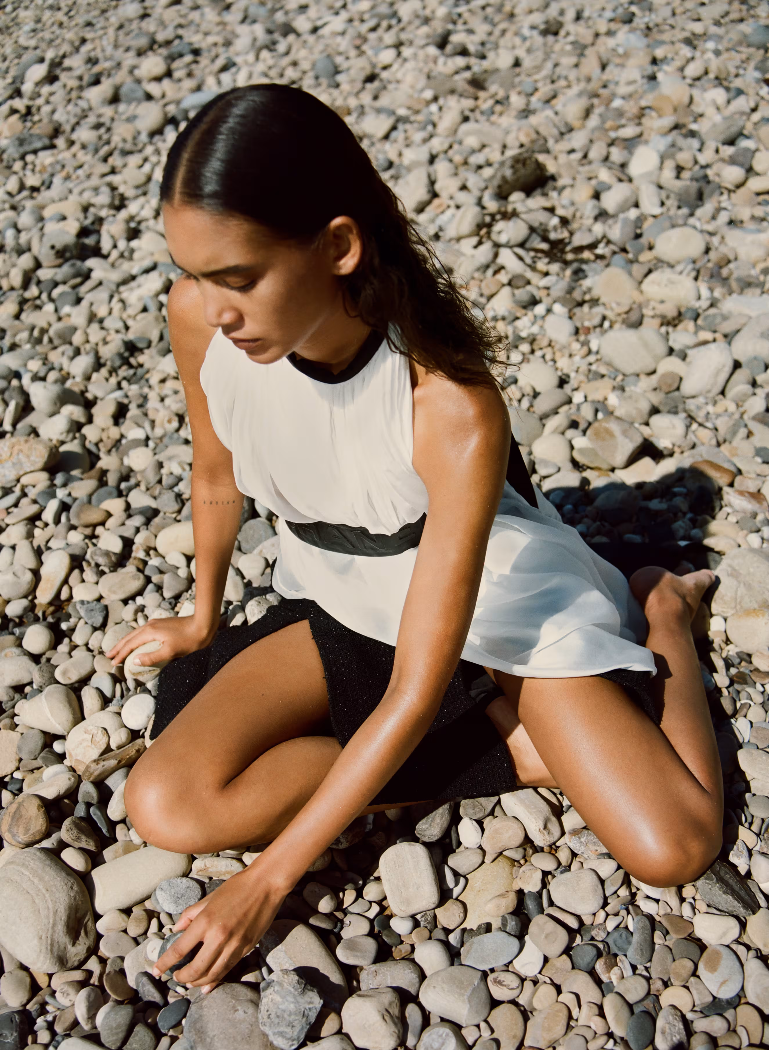 Summer wears top and skirt by CHANEL.
