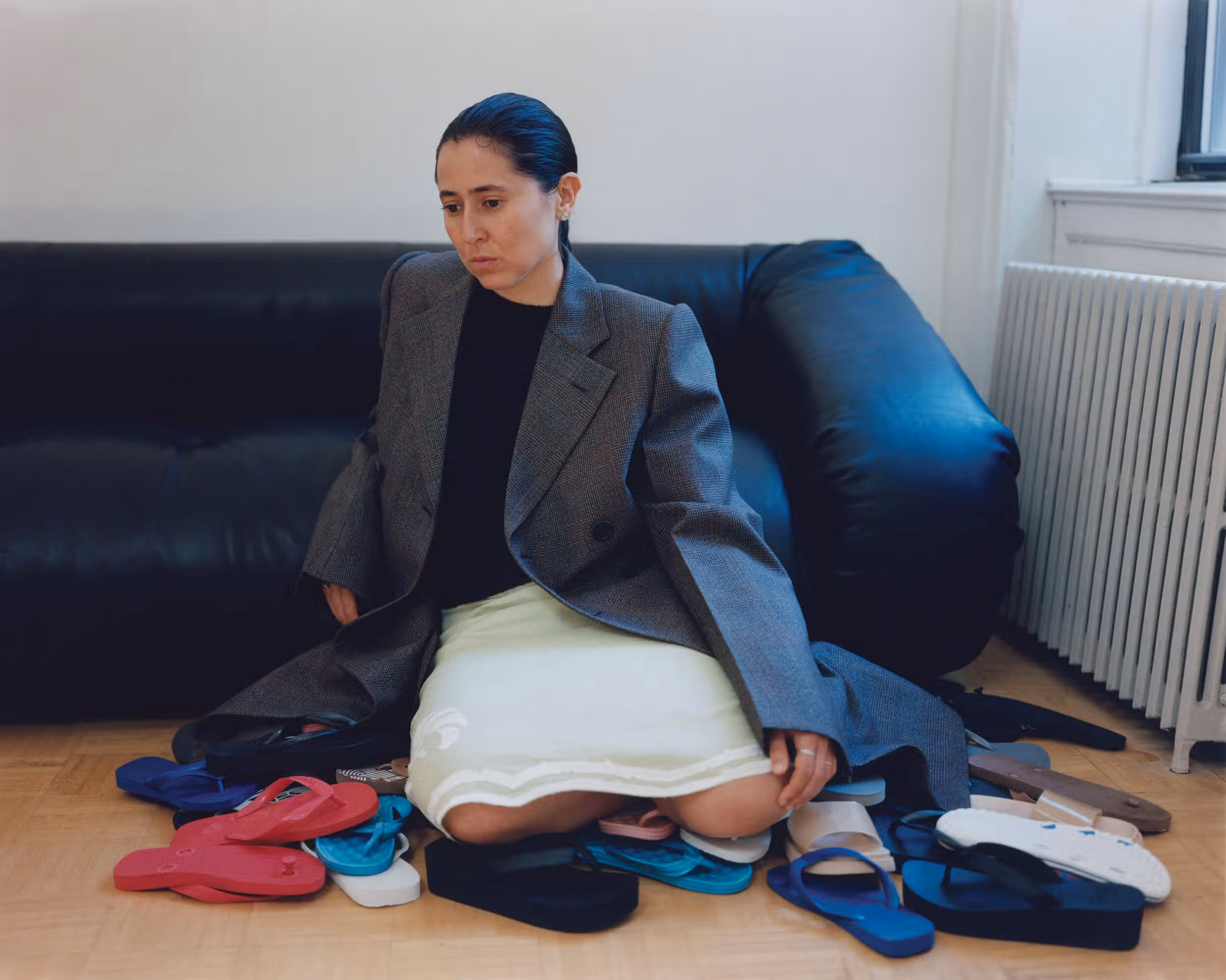 Meriem wears full look by PRADA.