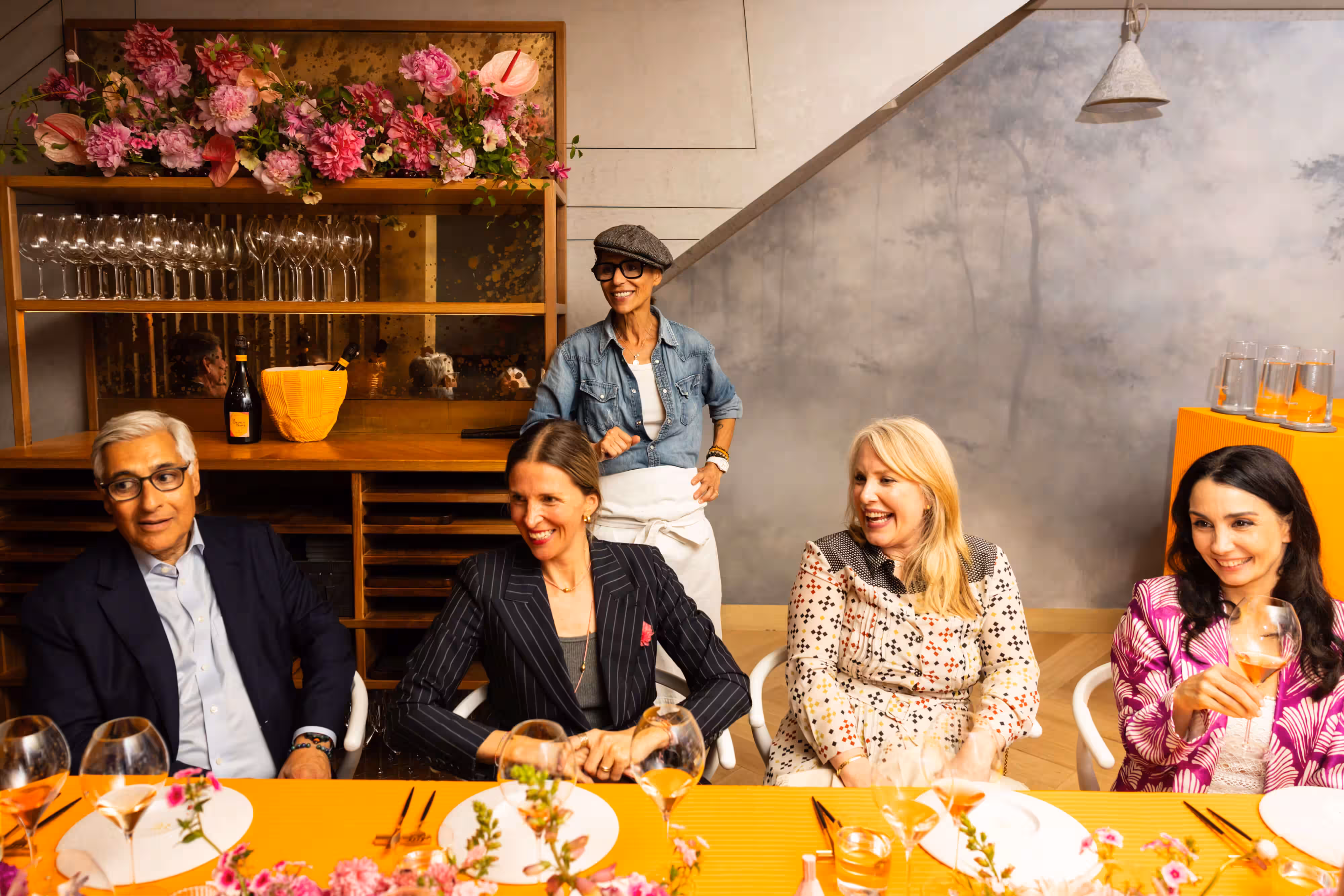 Dominique Crenn and table. Photography by Drew Altizer. Image courtesy of Veuve Clicquot.