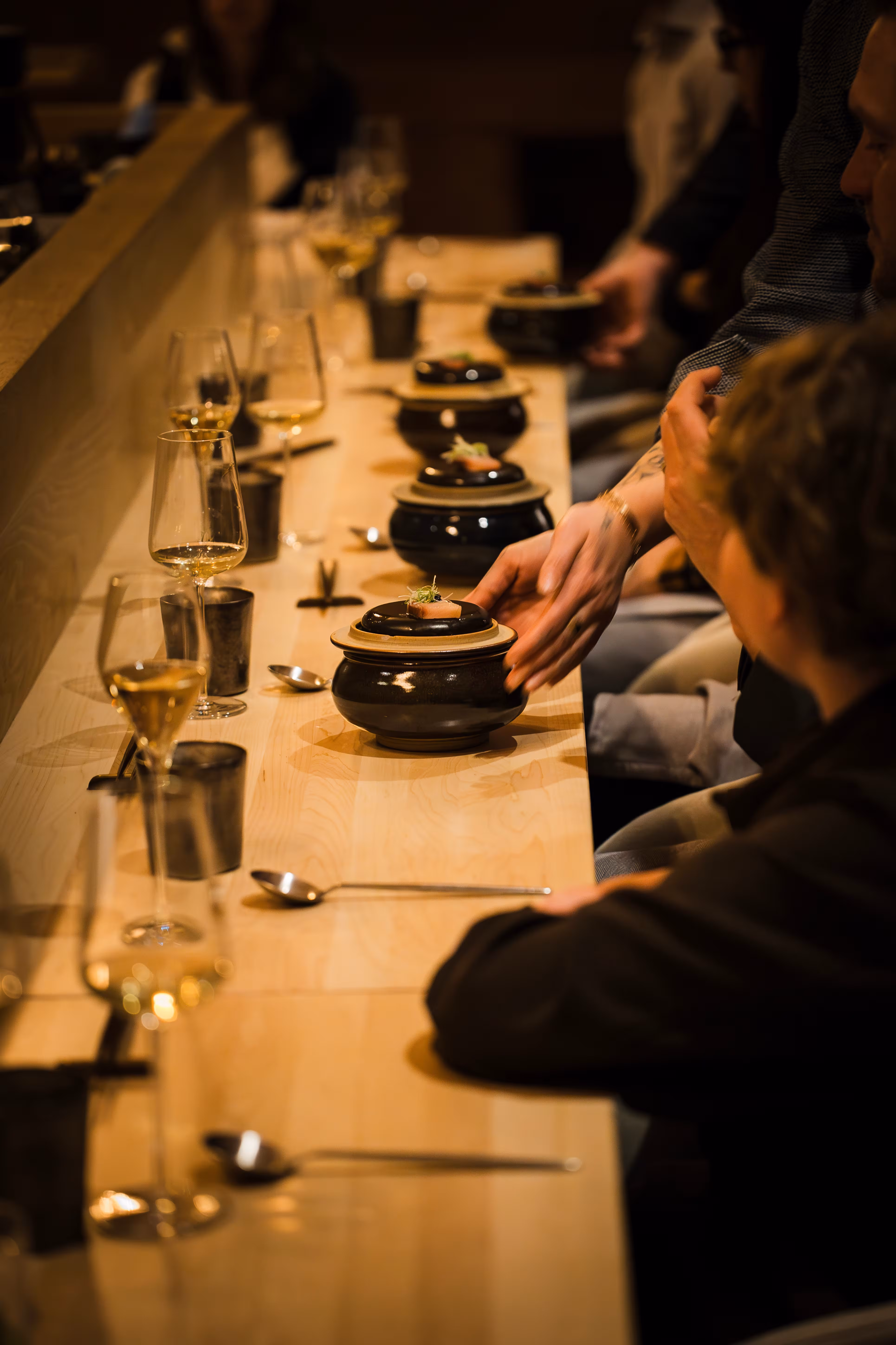 Guests receive the Kagoshima buri course as part of the 12-course cinematic dining experience menu. Photography by John Troxell.